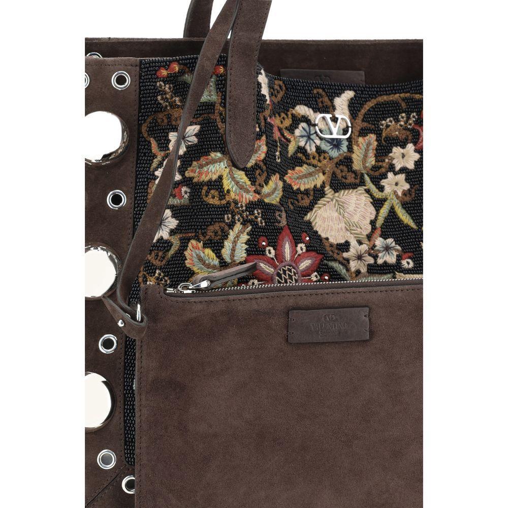 Front view with bag zipped and handles upright.