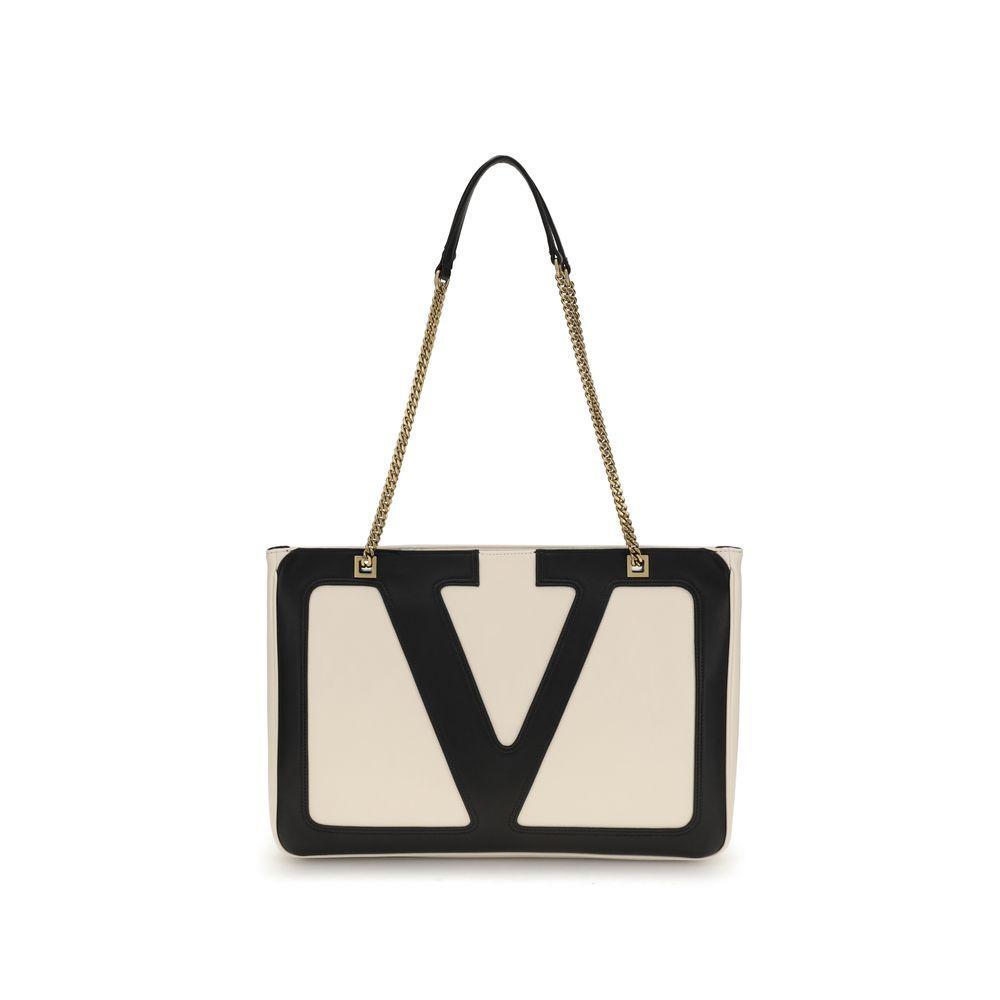 Front view with bag zipped and handles upright.