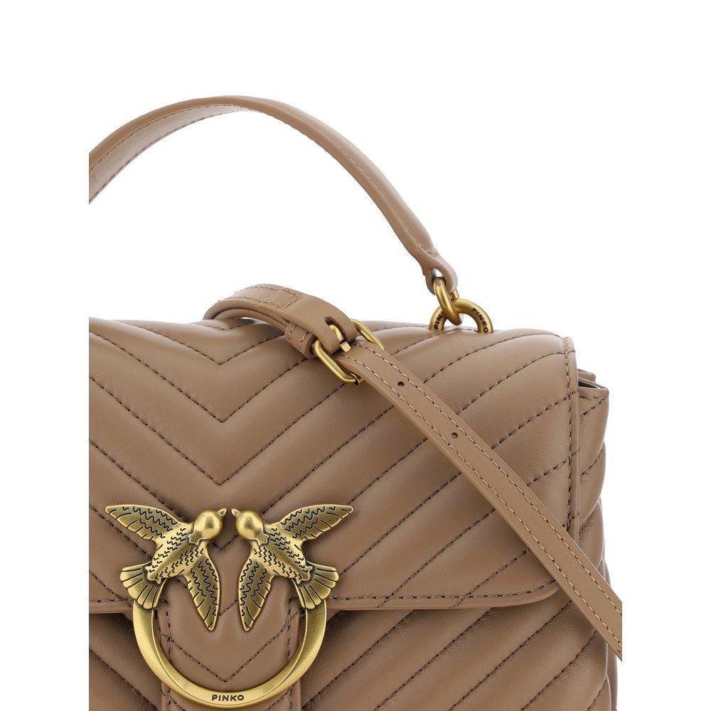 Front view with bag zipped and handles upright.